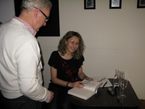 Lesley signing books