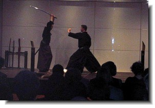 Sword fighting display with samurai swords