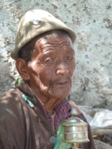 old guy with prayer wheel. He grinned like anything the moment I stopped photographing him!