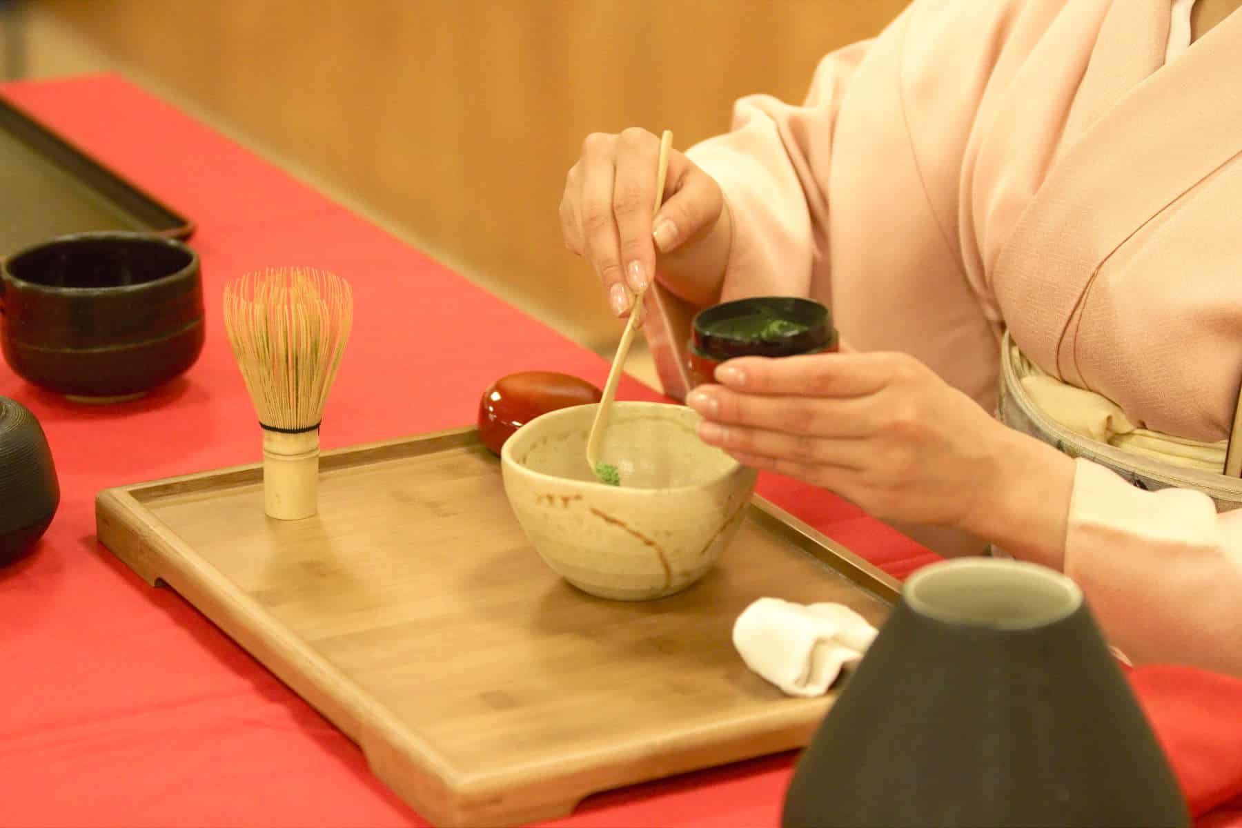 Close up view of the bowl, scoop and whisk