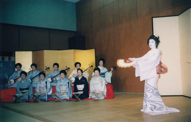 Geisha dancing with geisha accompaniment